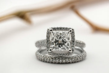 Diamond Engagement Ring with Matching Band on Soft White Background