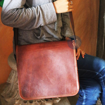 Women Carrying Brown Leather Crossbody Bag