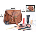  Brown Leather Saddle Purse Measuring 9 x 7 x 3 Inches, Displayed with Assorted Makeup Items and an Inset Image Showing Size Reference
