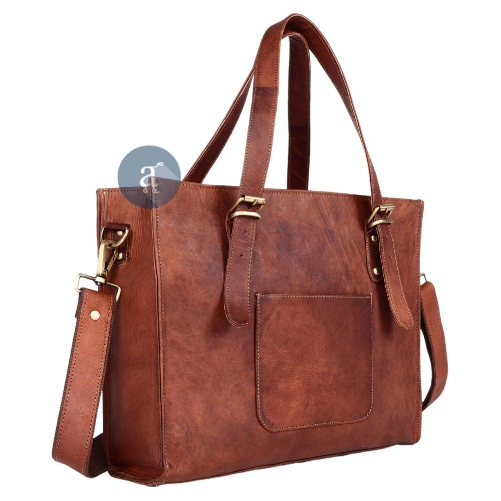 Side View of Brown Leather Laptop Tote Bag Showing Brass Buckle Details, Adjustable Strap, and Sleek Design
