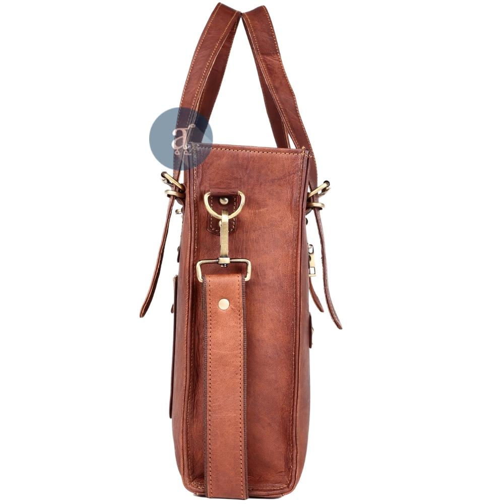 Side View of the Brown Leather Laptop Tote Bag Showing Brass Buckle Details, Adjustable Strap, and Sleek Design
