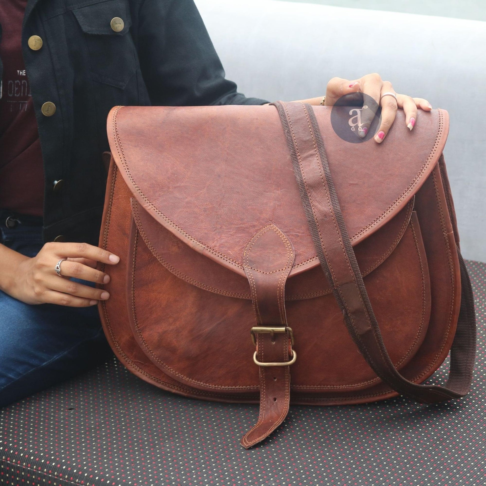 Women sitting with Crossbody Purse