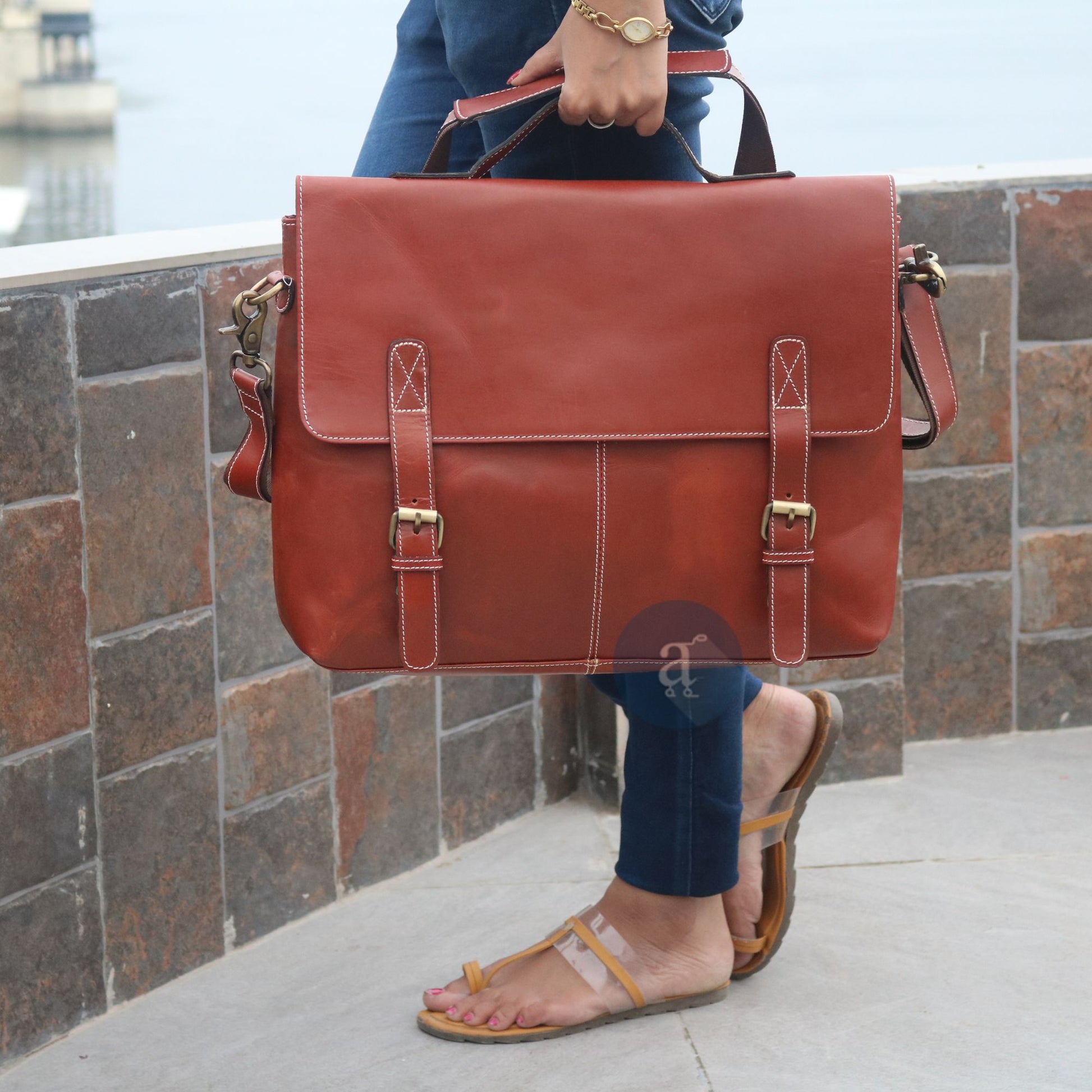 Woman Carrying The Messenger from Top Handle