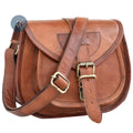 Brown Leather Saddle Purse with Buckle and Crossbody Strap, Showcasing Detailed Stitching and a Timeless Look