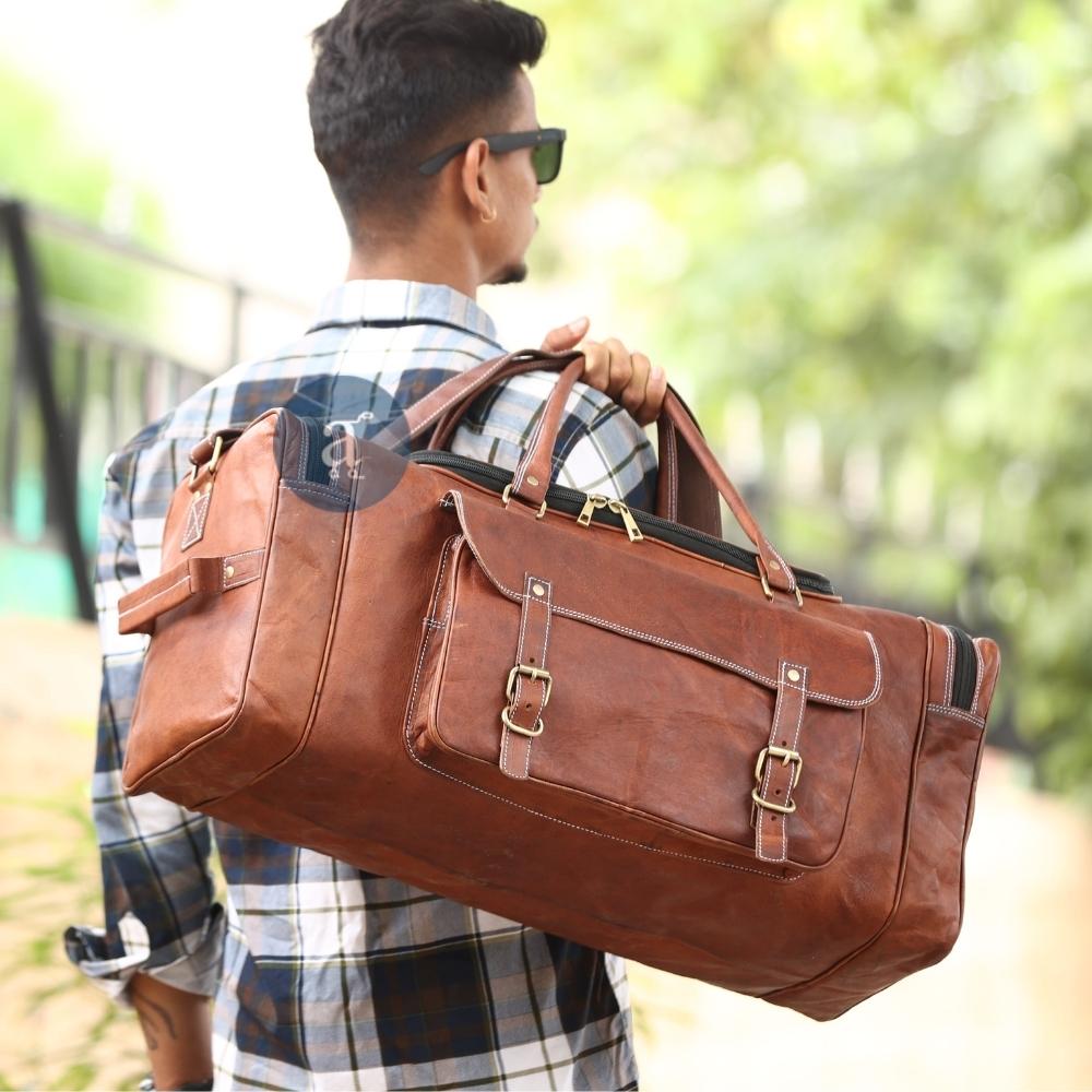 Men Carrying Large Leather Duffle Bag with Handles