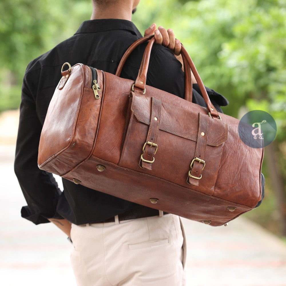 Men Carrying Leather Weekender Bag With Shoe Compartment on The Back