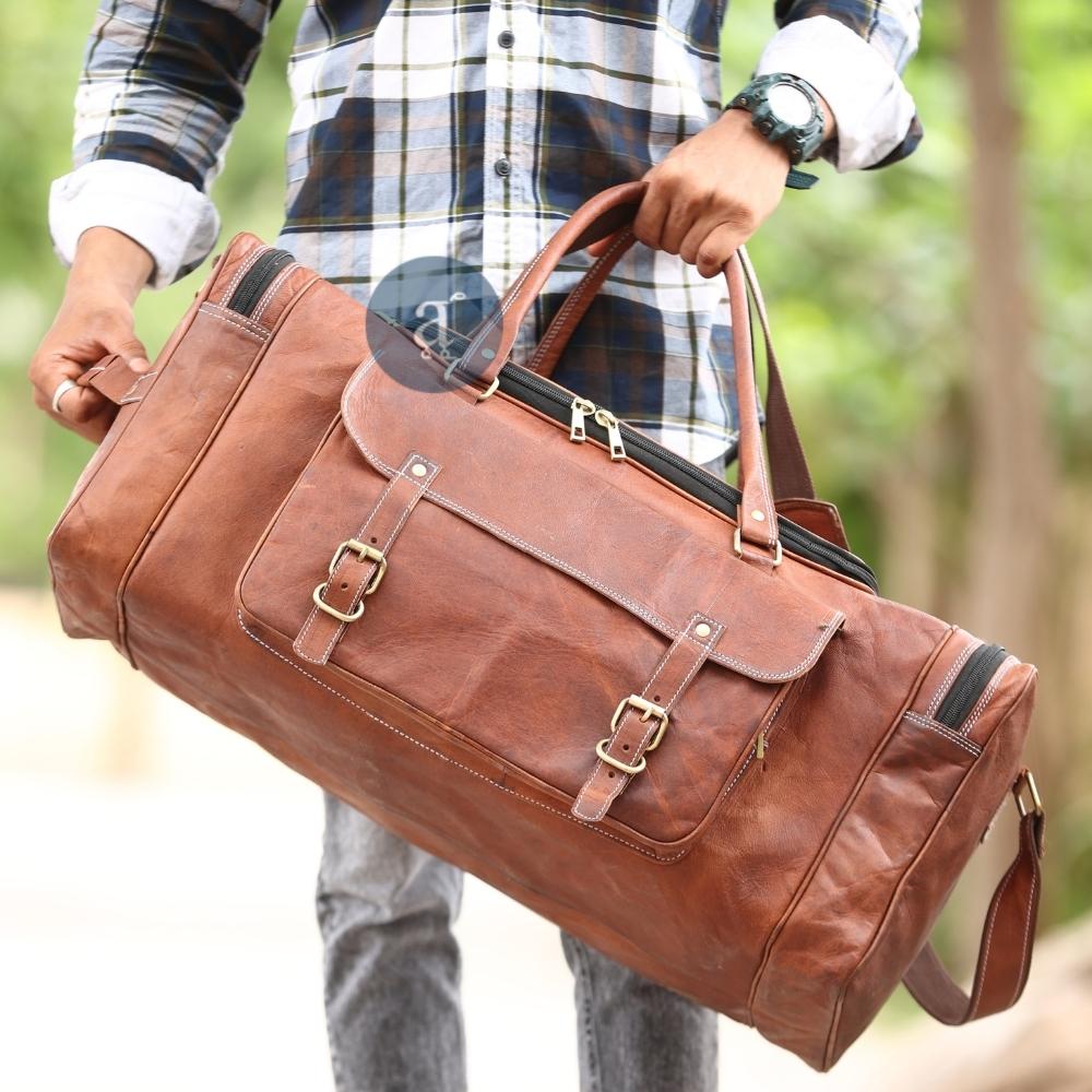 Picture of Men Carrying Large Leather Duffle Bag with Top and Side Handle