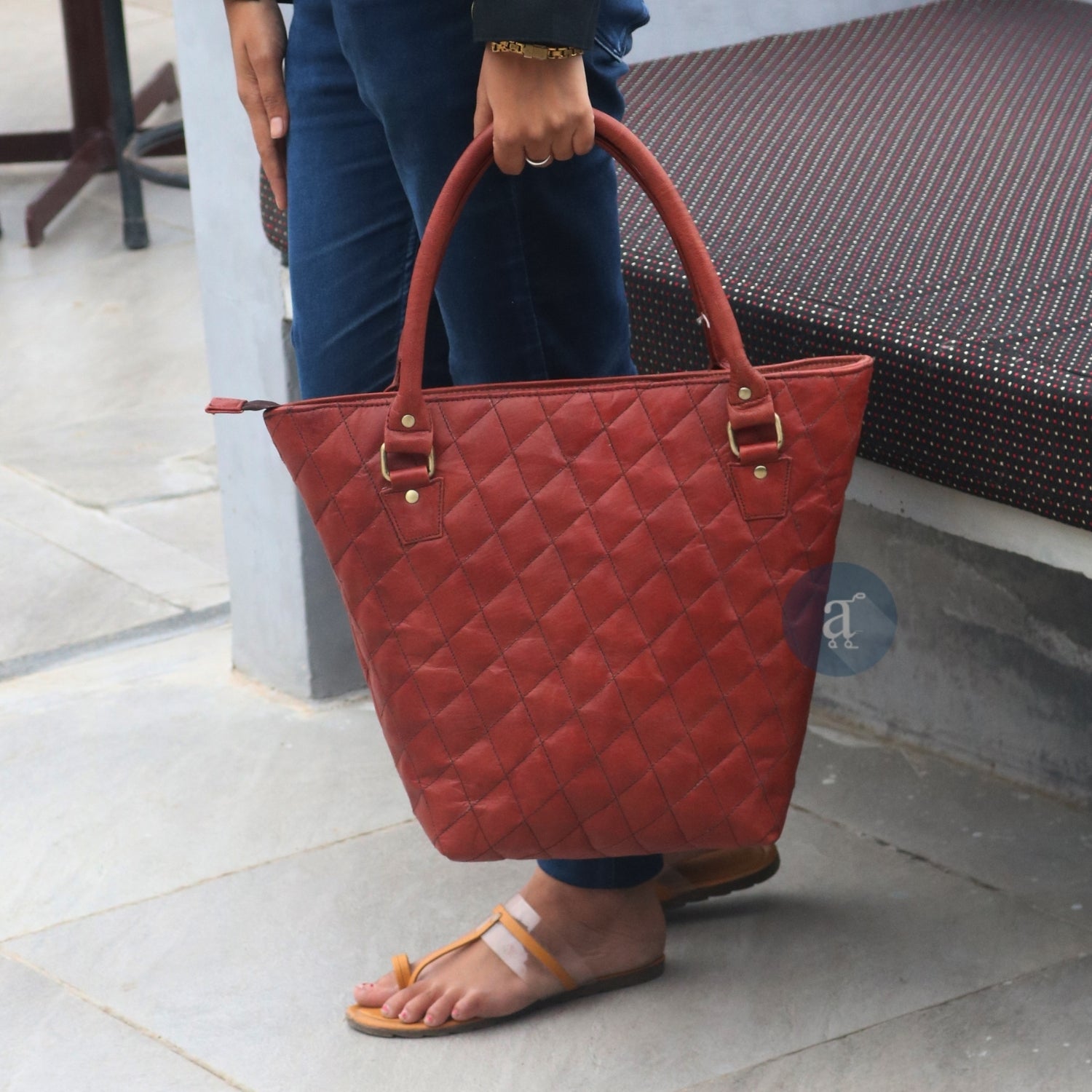 women carrying leather tote for work with top handles