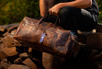 Men Carrying Leather Travel Bag